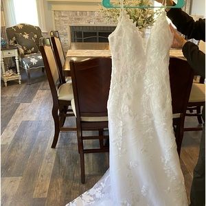 Brand new wedding dress, love the dress but not my idea